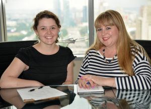 Accounting Manager Amanda Rzepka and Allison Fisher, a DePaul accounting major.