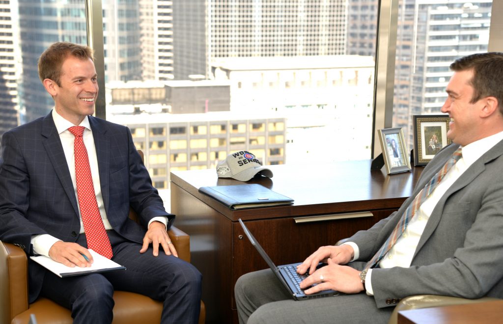 Dimitri Eliopoulos (BUS '01), managing director of Central Midwest, left, and Benjamin J. Albrecht, CFP, Vice President, Wealth Advisor at RMB Capital, right. 