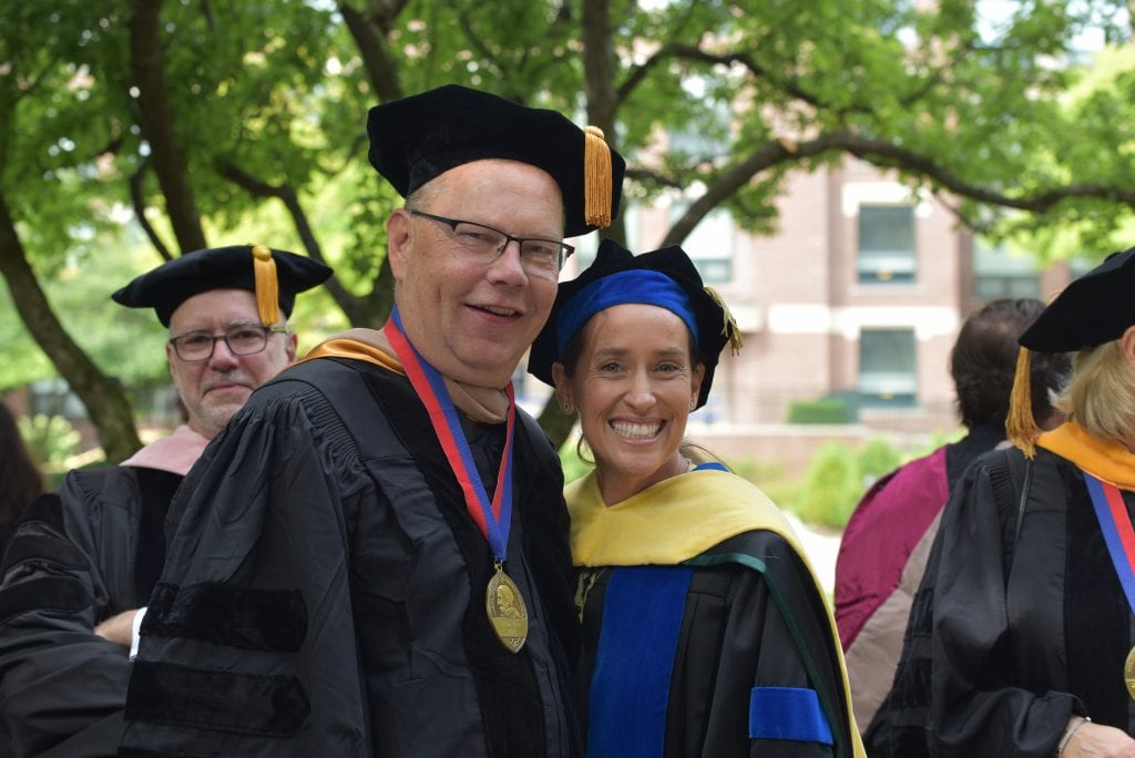 Tom Berry, finance professor and ​associate dean for faculty and student success, and Dean Misty Johanson at Academic Convocation.