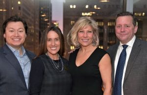 The Driehaus College of Business celebrated the launch of a new digital marketing concentration in its undergraduate marketing major. From left to right: John Digles, Business Dean Misty Johanson, Jacqueline Kuehl (BUS ’87, MBA ’95) and Steve Koernig (MBA ’94).