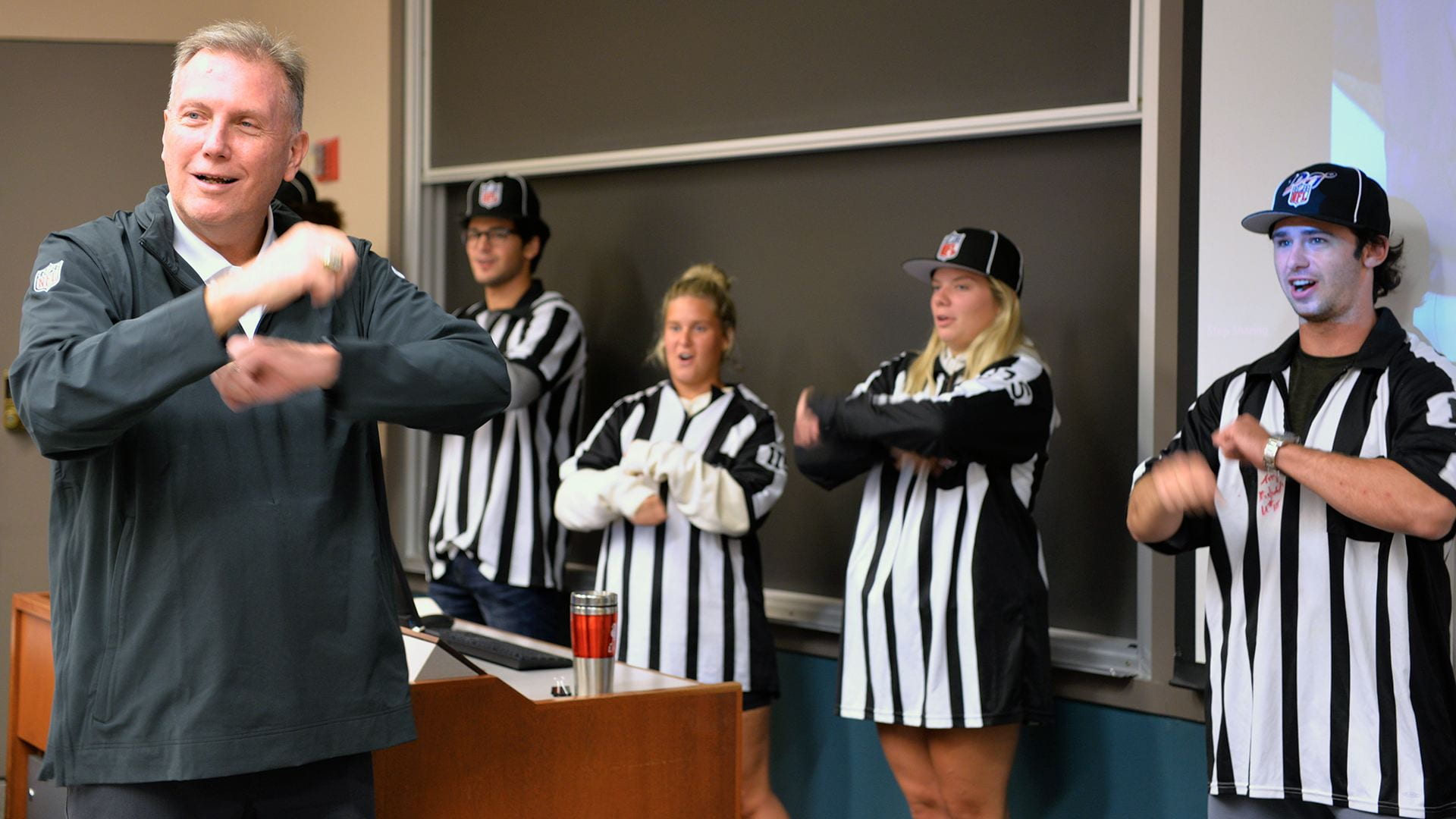 Gridiron in the Classroom: Referee Tony Michalek helps Clark's class make the right calls.
