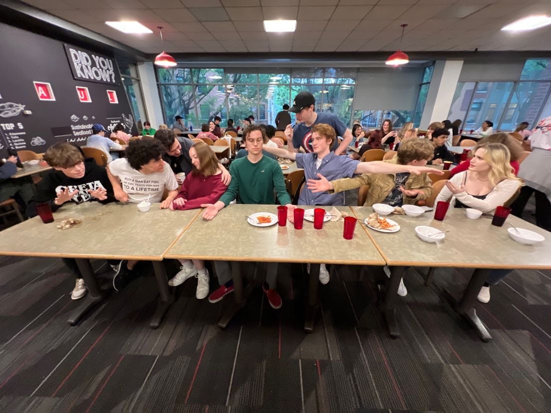 A picture of Jeff and his friends in the DePaul University dining hall recreating the last supper.