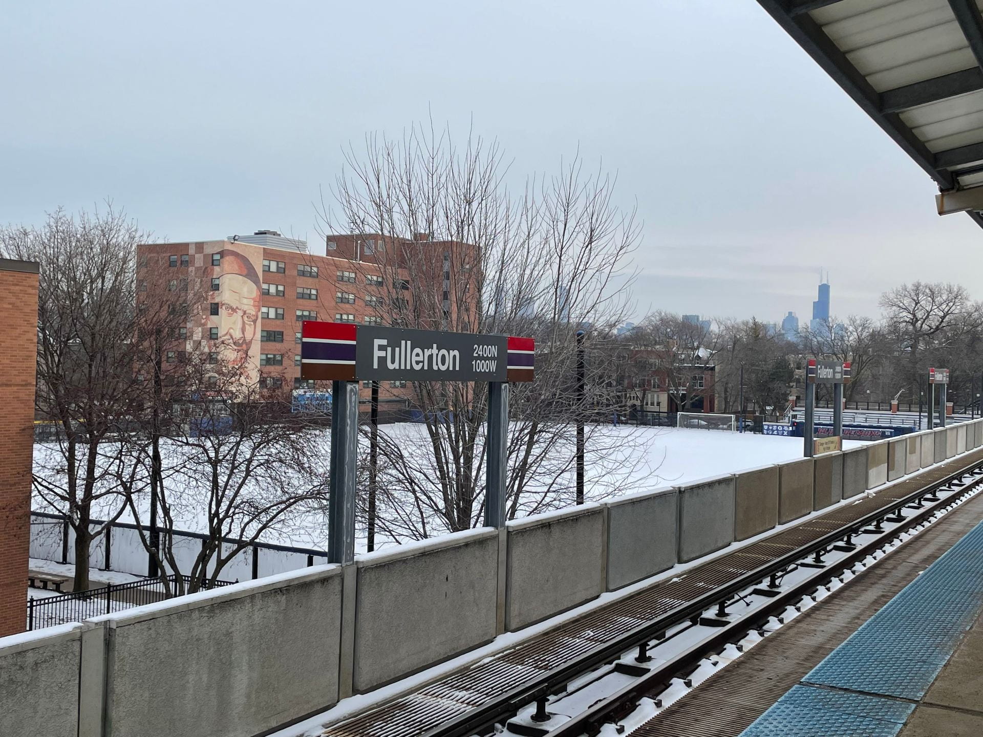 A photo from the Fullerton CTA stop showing McCabe Hall and Wish Field on DePaul University’s Lincoln Park Campus.