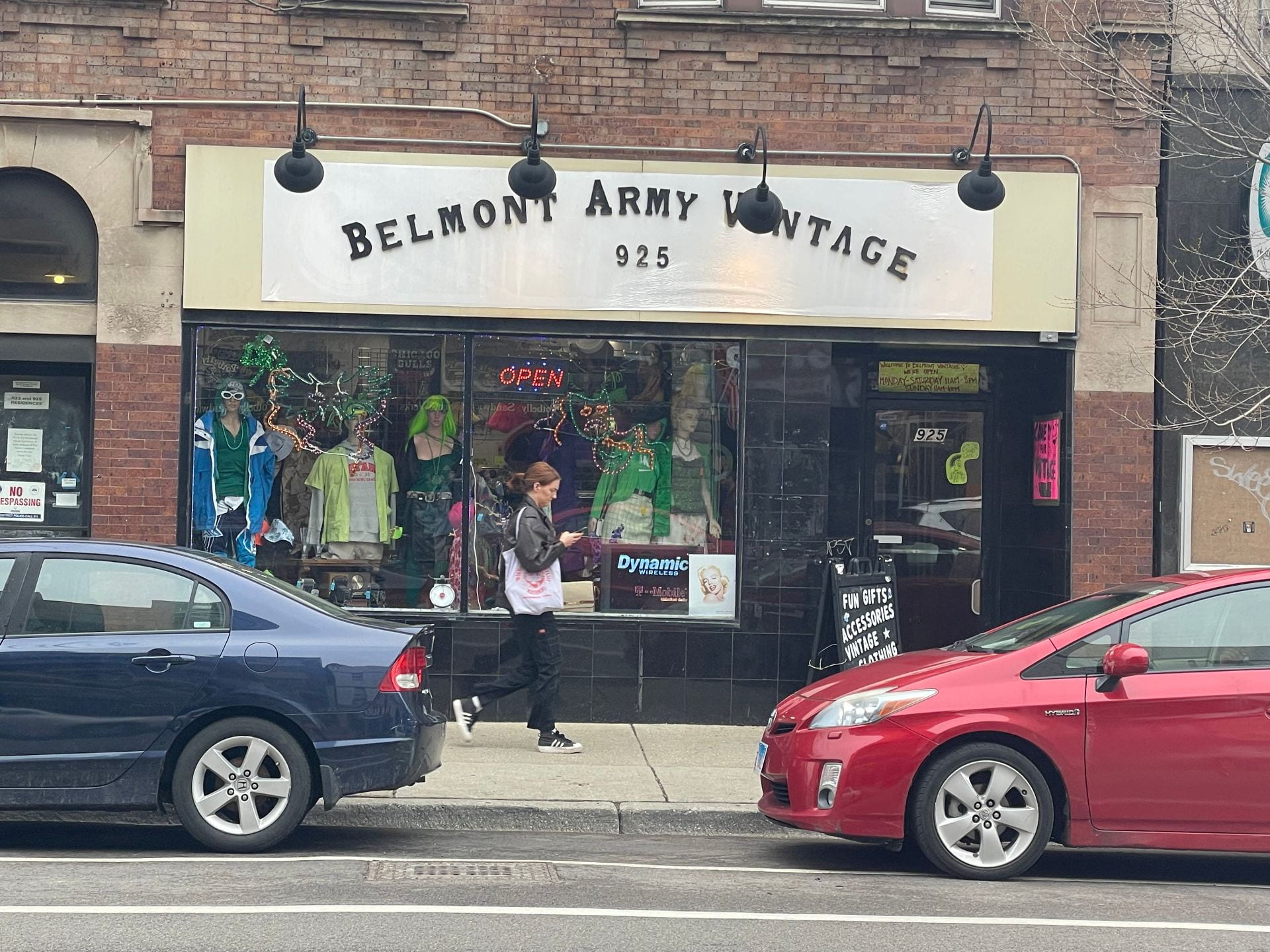 A photo showing the storefront of Belmont Army Vintage, a vintage and thrift store located on Belmont Ave. in Chicago.